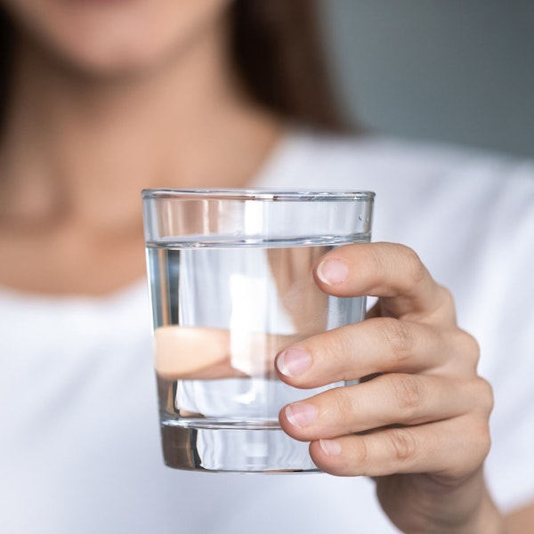 Glass of water in hand