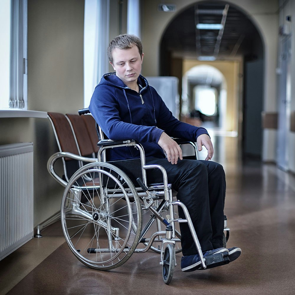 Depressed man in wheelchair