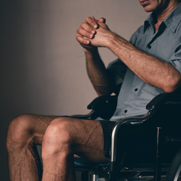 Man in a wheelchair after a personal injury