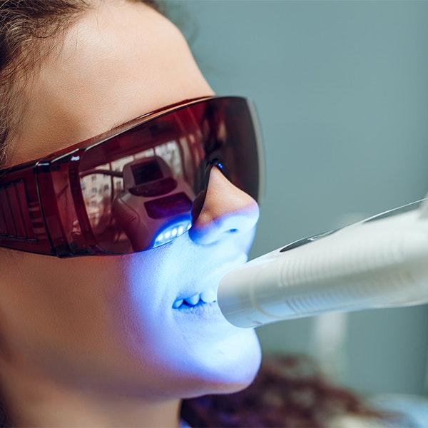 Patient receiving whitening treatment