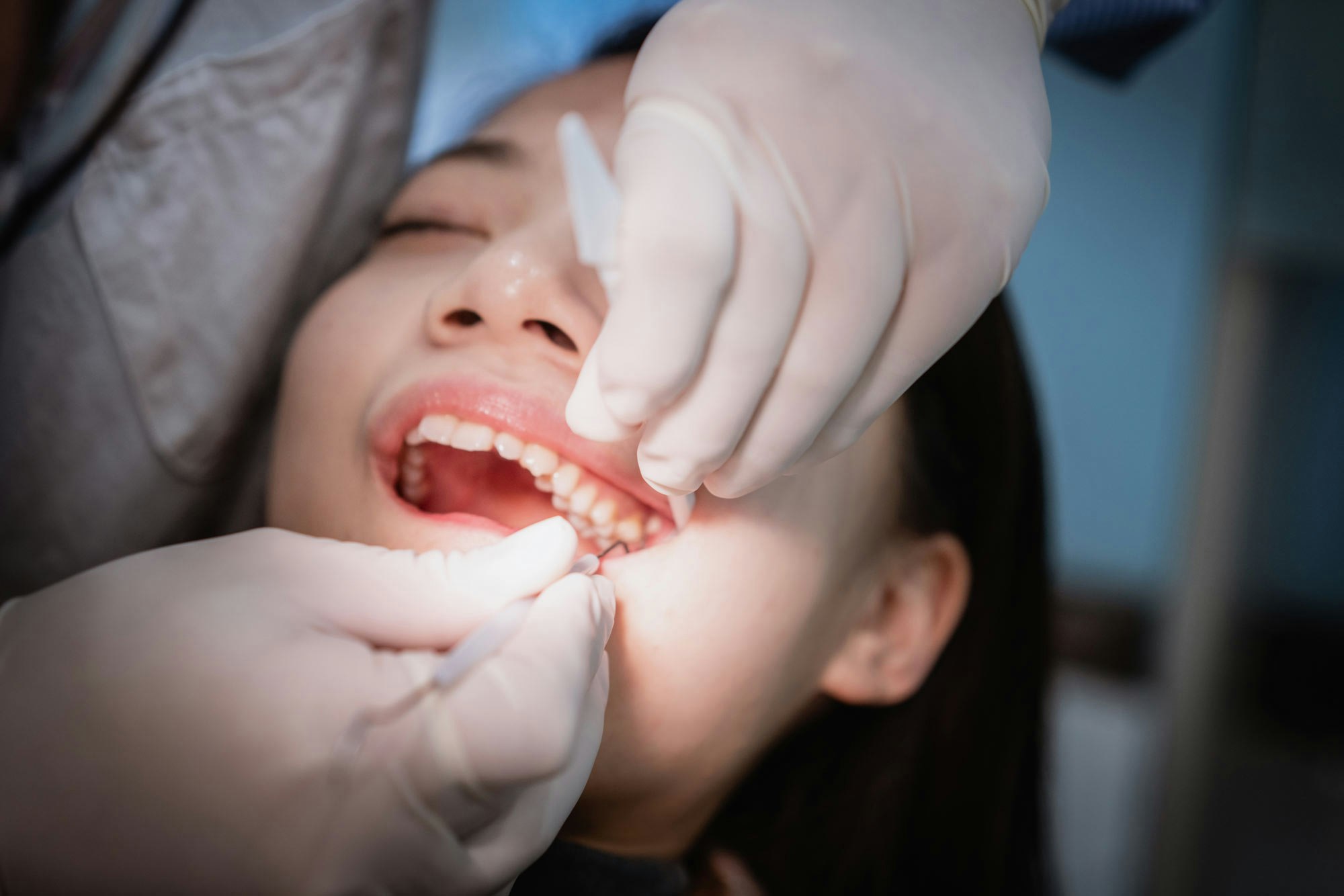 Younger patient receiving dental care