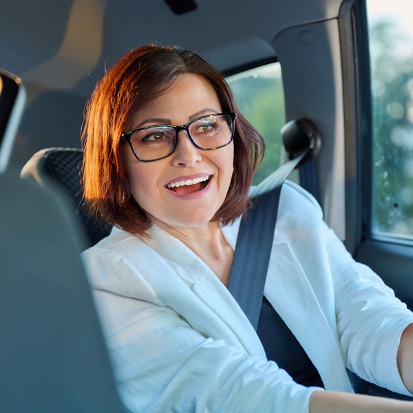 Woman being chauffeured