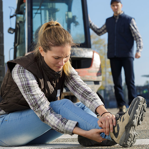 Injured woman on job site