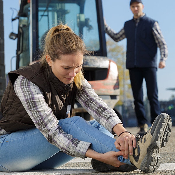Injured woman on job site