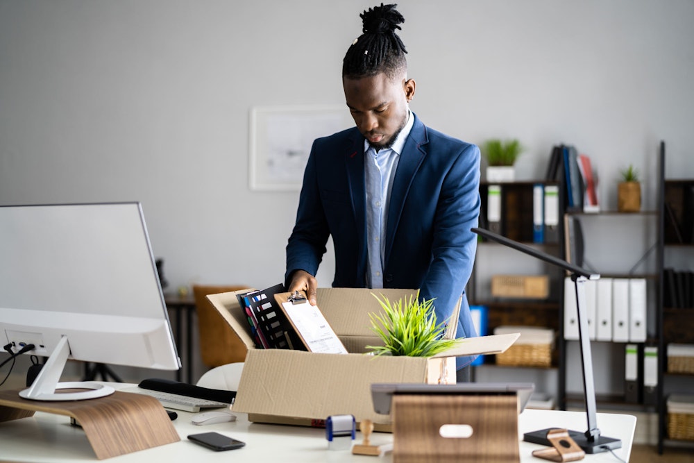 Worker packing his belongings